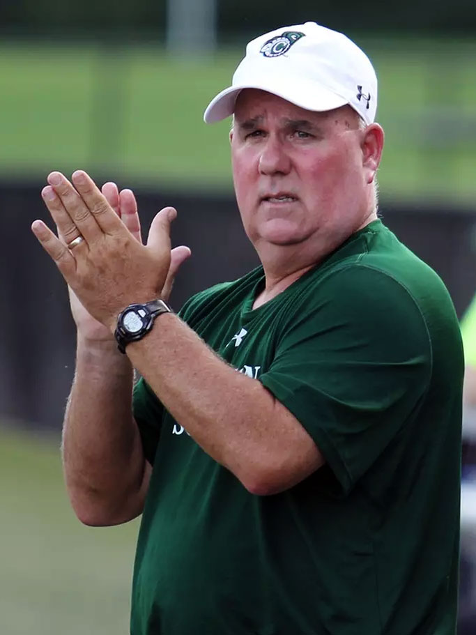 Coach John O'Connor clapping